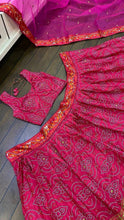 Pink and orange bandhani look Lehenga