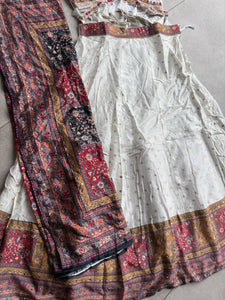 Elegant white embroidered Chaniya Choli with colourful dupatta