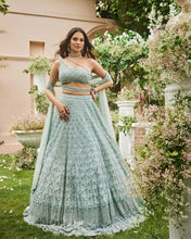 Sea green sequinned Lehenga with belt