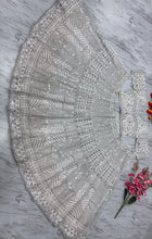 White lehenga with silver embroidery