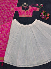 White and pink bandhani lehenga