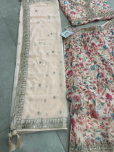 Tinge of cream and pink organza floral Lehenga