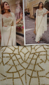 Elegant Ivory Drape Saree with Embellished Blouse & Cape