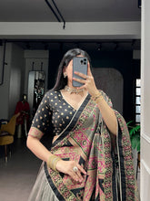Tussar silk printed and iconic lehenga in black (skirt stitched)