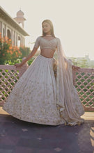 Sequins and bead work off white Lehenga