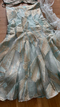 Icy blue lehenga with champagne gold work