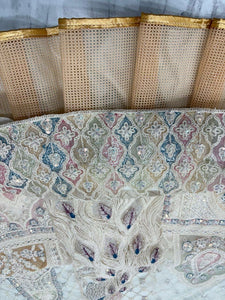 Ivory lehenga with peacock and sequin embroidery