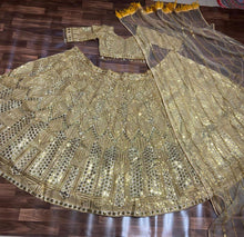 Golden hour - gold embellished net Lehenga