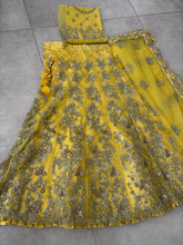 Yellow and silver super soft net lehenga