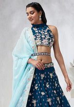 Teal Lehenga with contrasting dupatta