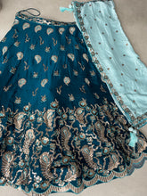 Teal blue embroidered Georgette Lehenga with the sky blue dupatta