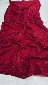 Red sequinned saree