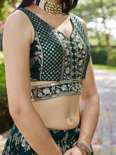 Dola silk jacquard Lehenga in green