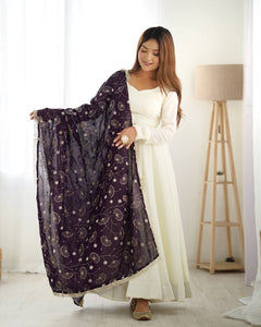 Silk off white gown with dark purple lace dupatta