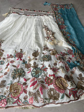 White embroidered Lehenga with sea green dupatta