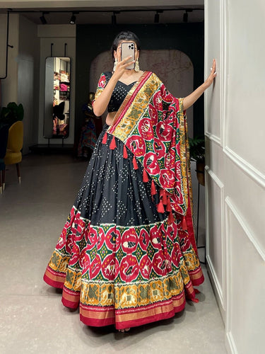 Tussar silk lehengas with bandhej and patola print (skirt stitched) - black