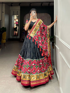 Tussar silk lehengas with bandhej and patola print (skirt stitched) - black