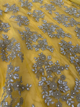 Yellow and silver super soft net lehenga