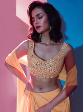 Ariana - pastel orange engagement Lehenga