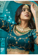 Royal collection - lino silk and satin ruffle style lehenga in emerald green