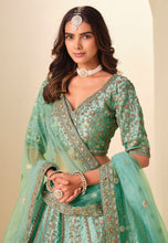 Sea green and gold embroidered art silk Lehenga