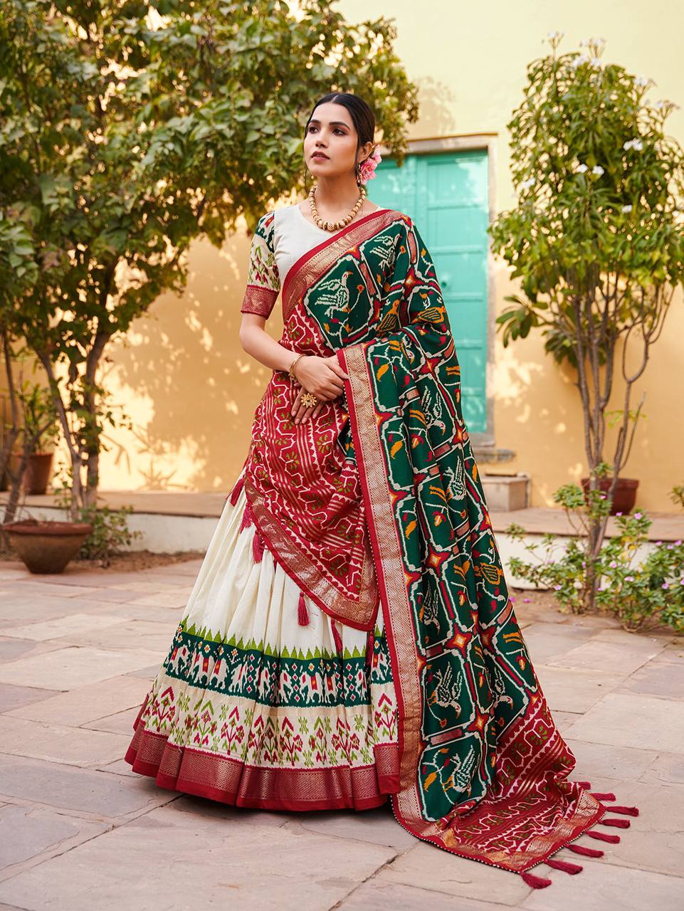 Tussar silk and patola print Lehenga in white and green
