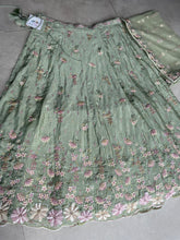 Pistachio green georgette embroidered flared Lehenga
