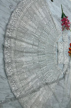 White lehenga with silver embroidery