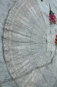 White lehenga with silver embroidery