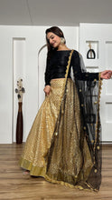 Black and gold silk Lehenga