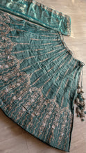 Turquoise chiffon zari embroidered lehenga