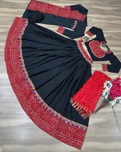 Simple black readymade chaniya choli (matching men’s dhoti set available)