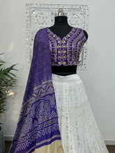 Purple Bandhani and white embroidered Lehenga