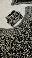 Black and gold embroidered lehenga