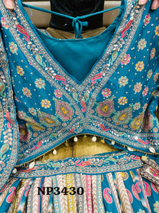 Niks collection - teal blue crepe silk printed lehenga