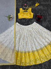 Yellow and off white jacquard Lehenga