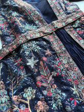 Navy blue gown with jacket and belt