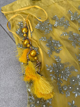 Yellow and silver super soft net lehenga
