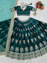 Emerald green and gold motifs lehenga