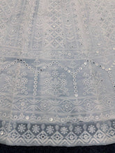 White and pink bandhani lehenga