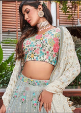 Sage green with a pop of floral colour lehenga