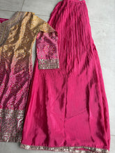 Pink and yellow bandhani print flared pants suit