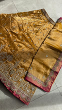 Mustard tissue embroidered lehenga