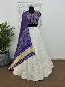 Purple Bandhani and white embroidered Lehenga