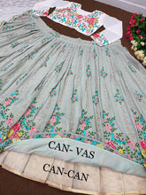 Sage green with a pop of floral colour lehenga