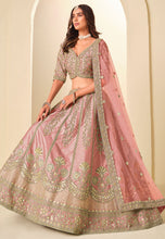 Pink and gold embroidered art silk Lehenga