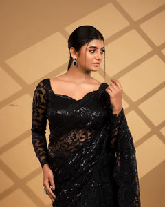 Black sequinned saree with long sleeves blouse