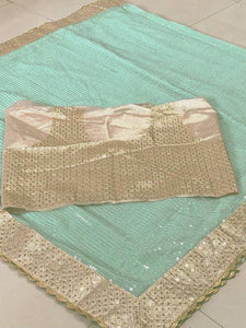 Sea green georgette saree