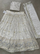 Beautiful white Lehenga with silver sequins