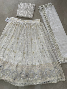 Beautiful white Lehenga with silver sequins